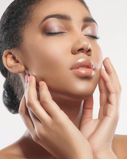 Client with smooth, radiant skin after laser skin care